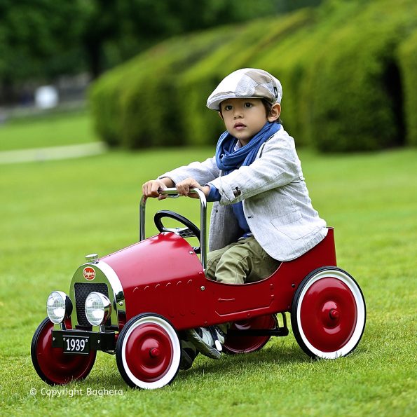 Classic Red Pedal Car with boy